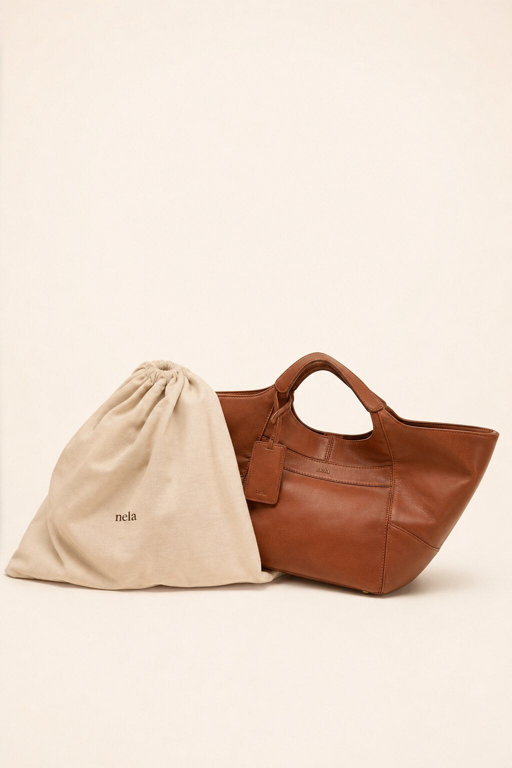 Nora with its cotton dust bag